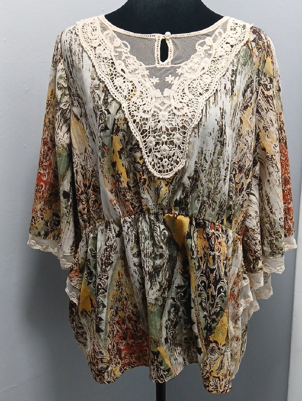 Flowy blouse with winged sleeves